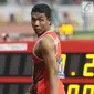 Pelari cepat Indonesia, Lalu Muhammad Zohri usai kualifikasi lari 100 meter Asian Games 2018 di Stadion GBK, Jakarta, Sabtu (25/8/2018). Lalu M Zohri mencatat waktu 10,27 detik dan berhak tampil di semifinal. (Liputan6.com/Helmi Fithriansyah)