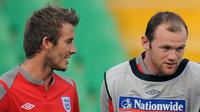 David Beckham dan Wayne Rooney (ALEXANDER NEMENOV / AFP)