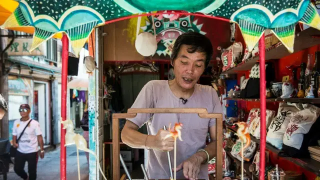 Pemahat Permen Hong Kong, The CandyMan (AFP/Isaac Lawrence)
