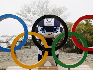 Ajang Olimpiade Tokyo tinggal menghitung hari. Setelah ditunda selama setahun akibat pandemi Covid-19, pesta olahraga terbesar di dunia itu akan diselenggarakan pada 23 Juli 2021. (Foto:AFP/Kim Kung-Hoon,Pool)