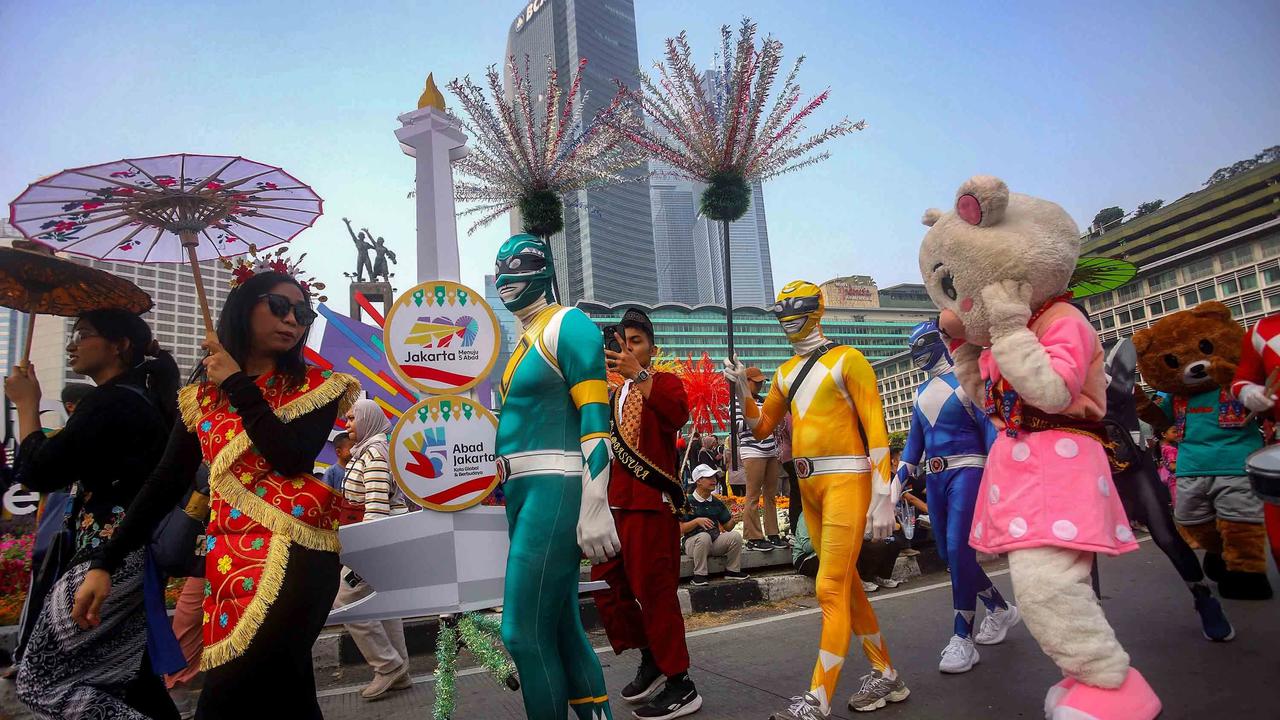 FOTO: Pawai Budaya Betawi Semarakkan HUT ke 499 Jakarta di Bundaran HI