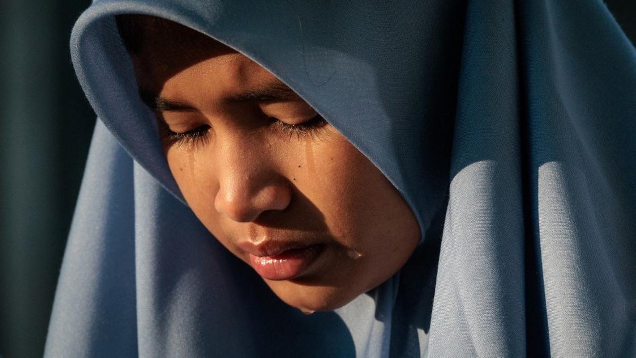 FOTO: Mengenang 20 Tahun Tsunami Aceh, Doa dan Air Mata Mengalir untuk Para Korban di Kuburan Massal