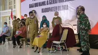 Pencanangan vaksinasi Covid-19 bagi ibu hamil dan gerai vaksinasi online Kabupaten Blora. (Liputan6.com/Ahmad Adirin)