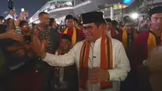 Momen Pramono-Rano Diiringi Tanjidor Hadiri Puncak HUT Jakarta