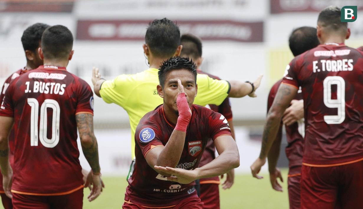 Pemain Borneo FC, Wildansyah melakukan selebrasi usai mencetak gol ke gawang Persita Tangerang dalam laga pekan ke-6 BRI Liga 1 2021/2022 di Stadion Pakansari, Bogor, Sabtu (10/2/2021). (Bola.com/M Iqbal Ichsan)