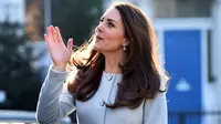 Kate Middleton selalu tampil modis meski dalam keadaan hamil. Berikut sejumlah foto Kate ketika saat hamil. Kate menghadiri kopi pagi di Family Friends di Kensington, London tengah pada 19 Januari 2015. (AFP Photo/Ben Stansall)