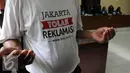 Nelayan berdoa jelang keputusan hakim terkait gugatan nelayan terhadap SK Gubernur DKI Nomor 2.238 Tahun 2014 tentang pemberian izin reklamasi Pulau G, Jakarta, Senin (31/5). (Liputan6.com/Helmi Afandi)