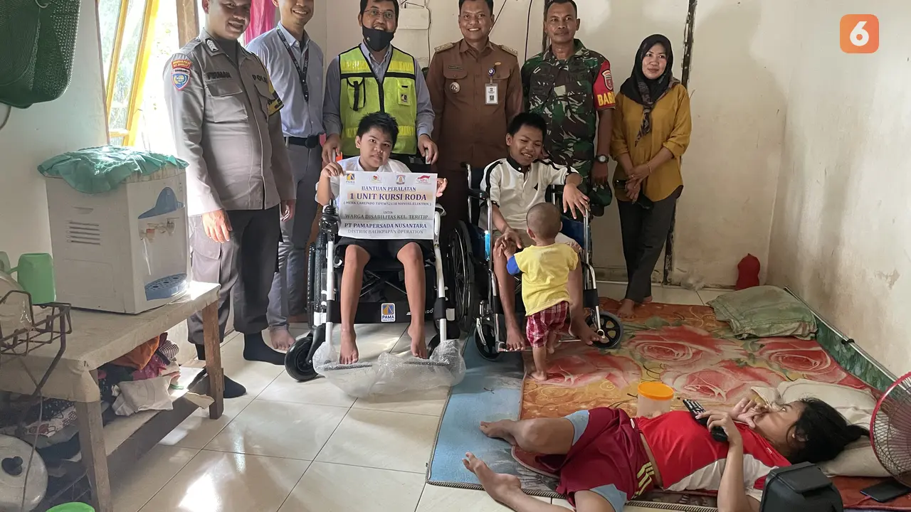 Bantuan Kursi Roda Elektrik