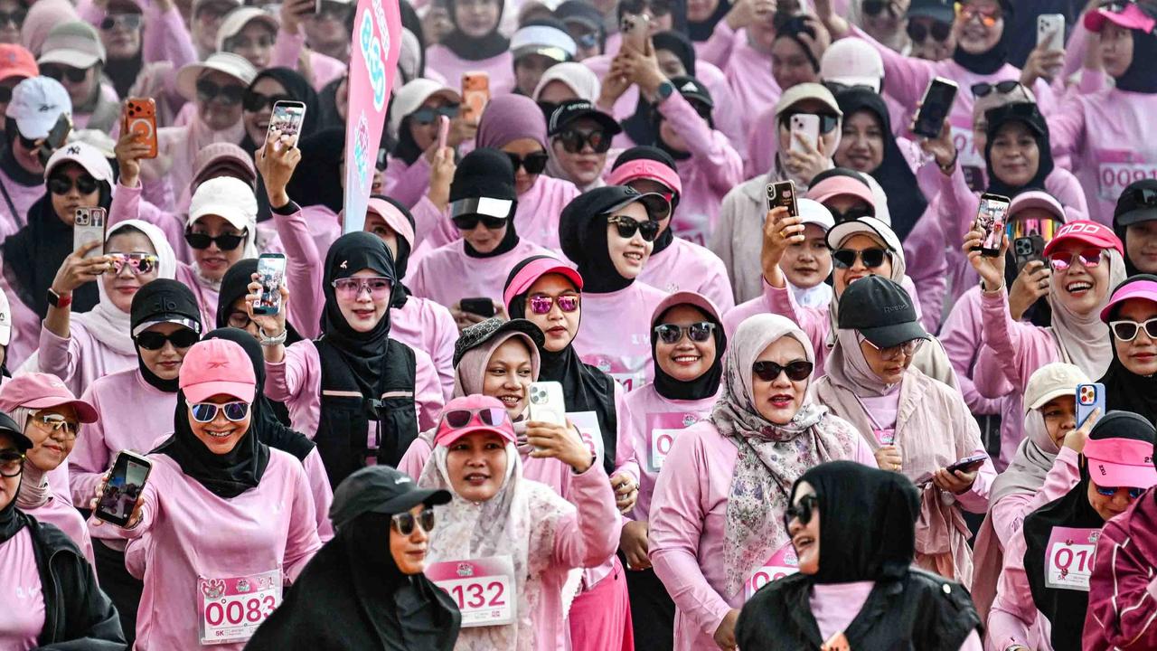 FOTO: Keseruan Lari Santai Khusus Perempuan di Banda Aceh