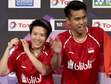 Tontowi Ahmad dan Liliyana Natsir berhasil meraih gelar juara setelah mengalahkan ganda China, Siwei Zheng/Qingchen Chen pada ajang  BWF World Championships 2017 di Emirates Arena, Glasgow (27/8/2017).  (Jane Barlow(/PA via AP)