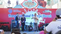 Menaker saat membuka gelaran kompetisi band dalam rangka menyambut May Day di Kalibatacity Square, Jakarta Selatan, Minggu (29/4/2018).