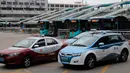 Armada taksi bertenaga listrik terlihat di kota Shenzhen, sebelah selatan China pada 7 Januari 2019. Taksi listrik di Shenzhen yang berjumlah lebih dari 20.000 akan mengurangi emisi karbon sebanyak hampir 850.000 ton per tahun. (AP/Vincent Yu)