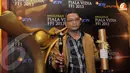 Chandra Djauzi pemenang nominasi penata suara terbaik di malam Anugerah Piala Vidia FFI 2013 dalam filmnya yang berjudul 'Miskin Susah Kaya Susah'(Liputan6.com/Andrian M Tunay) 