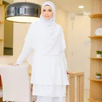 Model Baju Lebaran 2025 Warna Putih (instagram.com//tunic.muslimah.trendy)
 