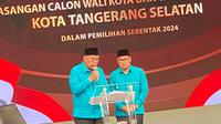 Pasangan nomor urut 1, Benyamin Davnie dan Pilar Saga Ichsan saat menyampaikan visi dan misi di debat Pilkada Kota Tangsel. (Liputan6.com/Pramita Tristiawati)
