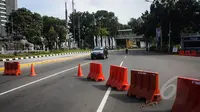 Pengalihan arus lalu lintas. (Liputan6.com/Faizal Fanani)