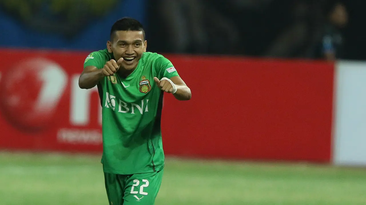 Gelandang Bhayangkara FC, Dendy Sulistyawan merayakan gol ke gawang Arema FC (Liputan6.com / Helmi Fithriansyah)