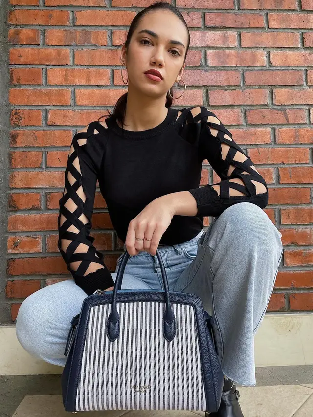 Haico Van Der Veken dengan tas Knott dari Kate Spade New York