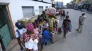 Hari Rabu menandai pertama kalinya sejak 15 September perbatasan dibuka kembali sebagian, meskipun Presiden Dominika Luis Abinader mempertahankan larangan mengeluarkan visa untuk warga negara Haiti yang ia terapkan bulan lalu. (AP Photo/Ricardo Hernandez)