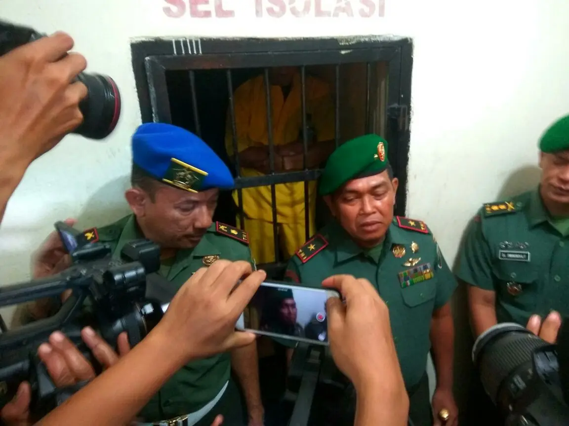 Anggota TNI Serda Wira Sinaga yang memukul anggota polisi ternyata mengidap gangguan jiwa (Liputan6.com/ M Syukur)