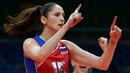 Tatyana Kosheleva melakukan selebrasi saat meraih point dalam bertanding melawan tim dari Korea Selatan di ajang Olimpiade 2016 di Maracanazinho, Rio de Janeiro, Brasil, (8/8). (AFP PHOTO/Johannes EISELE)
