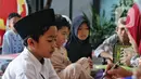 Diharapkan dengan mengikuti kegiatan pesantren kilat ini, anak-anak bisa terbebas dari pengaruh permainan gadget. (Liputan6.com/Angga Yuniar)