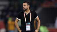 Gaya Xavi Hernandez saat mendampingi tim asuhannya, Al Sadd. (AFP/Karim Jaafar)