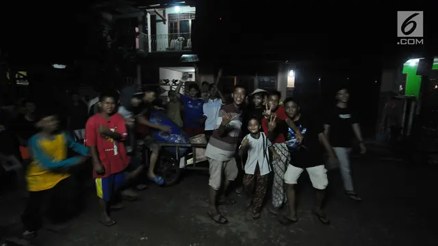 Tradisi Bangunkan Sahur