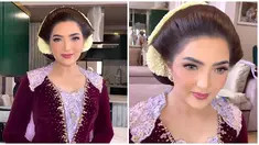 Acara mitoni merupakan tradisi upacara adat bagi perempuan hamil dalam budaya Jawa. Oleh karenanya keluarga Aurel Hermansyah dan Atta Halilintar kompak mengenakan baju adat Jawa seperti kebaya dan beskap. Wajahnya didandani oleh MUA ternama Hepi David, makeup flawless dan lipstiknya yang berwarna ungu selaras denga busana yang dikenakannya. (Liputan6.com/IG/@hepidavid)