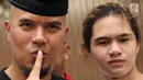 Ahmad Dhani Prasetyo usai menjalani sidang perdana kasus ujaran kebencian di PN Jaksel, Senin (16/4). Dhani dinilai melanggar Pasal 28 ayat 2 juncto Pasal 45A ayat 2 Undang-undang Nomor 19 Tahun 2016 tentang ITE. (Liputan6.com/Immanuel Antonius)