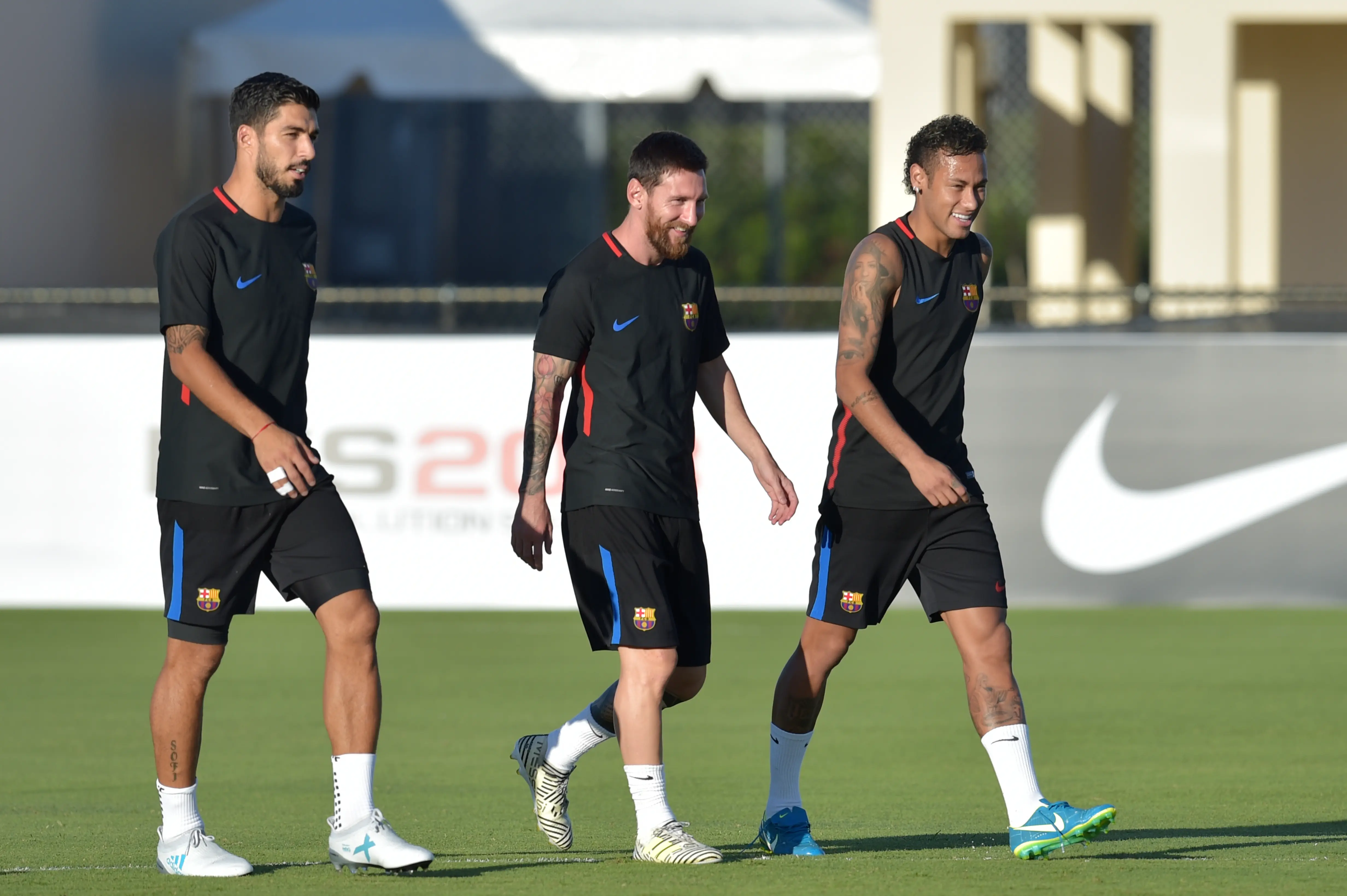 Trio MSN Barcelona, Lione Messi (tengah), Neymar (kanan), dan Luis Suarez bakal tinggal kenangan? (AFP/Hector Retamal)