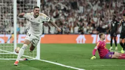 Dua gol Joselu yang dicetak pada menit ke-88 dan 90+1 memastikan kemenangan Real Madrid atas Bayern Munchen dengan skor 2-1. (Thomas COEX / AFP)