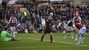 Pemain Chelsea Christian Pulisic merayakan setelah mencetak gol ke gawang Burnley pada pertandingan sepak bola Liga Inggris di Turf Moor, Burnley, Inggris, 5 Maret 2022. Chelsea menang 4-0. (Oli SCARFF/AFP)