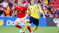 Bermain di rumah sendiri, Tim Dinamit sukses memetik kemenangan tipis 2-1 atas Swedia. (Liselotte Sabroe / Ritzau Scanpix / AFP)