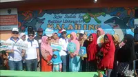 Menteri BUMN Rini Soemarno kunjungi Kampung apung Malahing (Foto:Liputan6.com/Bawono Y)