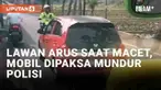 Kemacetan adalah hal yang tidak disukai dan dihindari bagi sebagian pengendara. Tak jarang beberapa oknum pengendara nekat mengambil hak jalan pengendara dari arah berlawanan demi menembus kemacetan. Upaya serupa dilakukan oleh mobil merah yang viral...