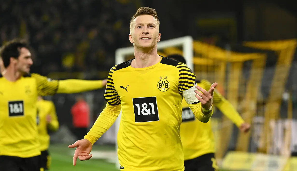 Marco Reus. Gelandang Jerman berusia 32 tahun yang kini memasuki musim ke-10 bersama Borussia Dortmund ini mampu mencetak 9 gol ke gawang Bayern Munchen yang dikawal Manuel Neuer dari total 30 laga termasuk saat ia memperkuat Borussia Monchengladbach. (AFP/Ina Fassbender)
