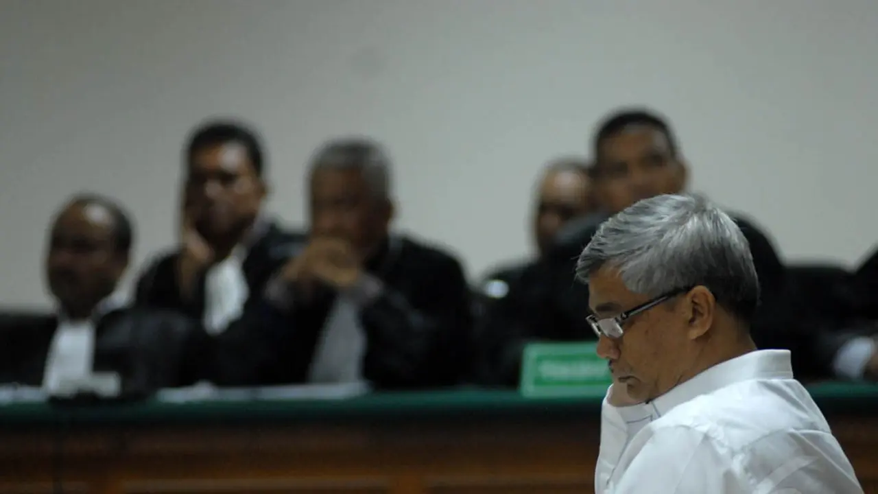 Wajah Melas Akil Mochtar Hadapi Sidang Vonis