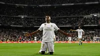 Winger Real Madrid, Rodrygo, berhasil menyumbangkan satu gol sekaligus membantu timnya menang 2-0 atas Osasuna pada laga pekan keenam La Liga, di Santiago Bernabeu, Rabu (25/9/2019). (AFP/OSCAR DEL POZO)