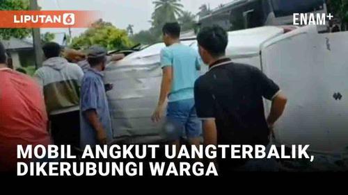 VIDEO: Mobil Pengangkut Uang Terbalik di Padang Pariaman dan Dikerubungi Warga
