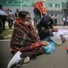 Sejumlah orang yang tergabung dalam warga Dairi Sumatera Utara menggelar aksi di depan Kedutaan Besar China di Jakarta, Rabu (24/8/2022). Dalam aksinya mereka menolak tambang di daerah Dairi dikarenakan dapat membahayakan lingkungan serta jiwa penduduk sekitar. (Liputan6.com/Faizal Fanani)