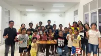Komunitas Indomanutd Jakarta merayakan ulang tahun ke-23 bersama anak-anak dari Panti Asuhan Kasih Sesama Umat, Tangerang. (Indomanutd)