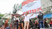 Calon presiden (capres) nomor urut tiga Ganjar Pranowo saat hadir dalam acara Hajatan Rakyat Sulawesi Utara. (Nanda Perdana Putra/Liputan6.com).