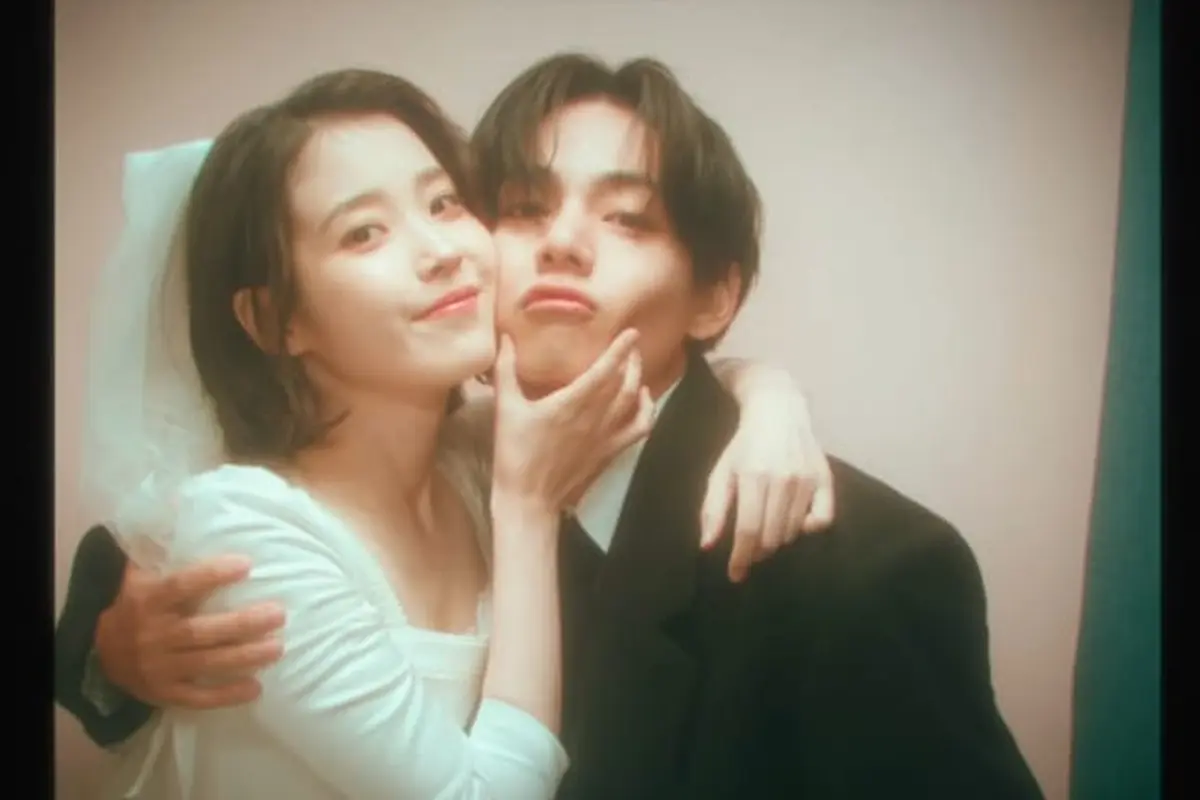 IU dan V BTS dalam lagu Love Wins All. (YouTube/ IU Official)
