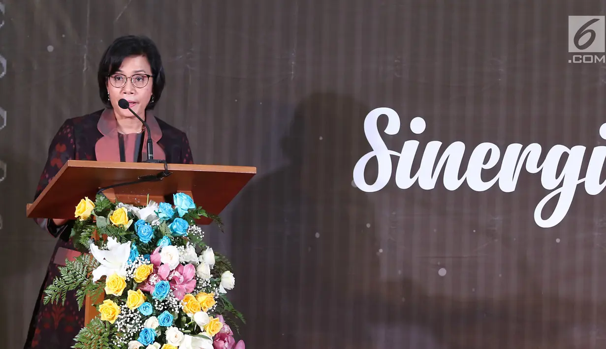 Menteri Keuangan Sri Mulyani memberi sambutan saat memberikan apresiasi dan penghargaan kepada 30 Wajib Pajak (WP) di Jakarta, Rabu (13/3). Dari 30, terdapat enam pengusaha yang masuk dalam kategori WP Orang Pribadi. (Liputan6.com/JohanTallo)