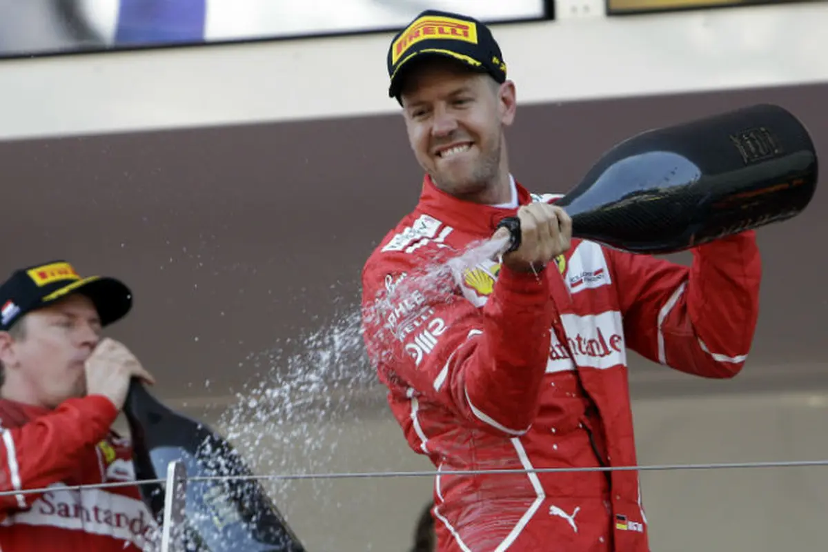 Pebalap Ferrari, Sebastian Vettel.