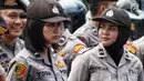 Polisi wanita (polwan) diturunkan untuk mengamankan peringatan Hari Buruh 2019 di kawasan Bundaran HI, Jakarta, Rabu (1/5/2019). Aparat kepolisian menutup Jalan Sudirman, Jakarta Pusat arah Bundaran Hotel Indonesia (HI) atau sebelum Halte Transjakarta Tosari. (Liputan6.com/Johan Tallo)