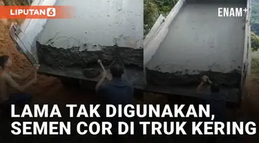 Sebuah truk bawa semen cor namun kering karena lama tak digunakan mengundang perhatian