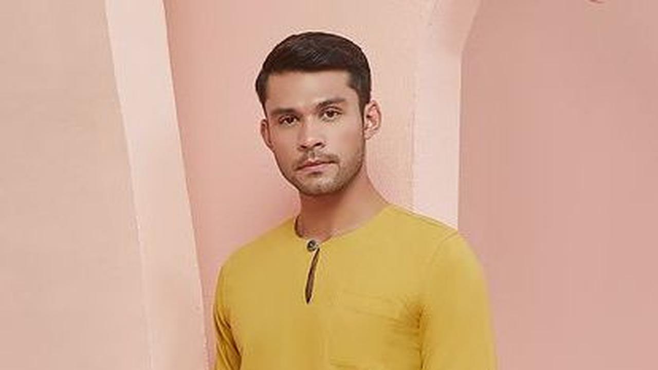 <b>Baju Kurung Model Teluk Belanga</b>