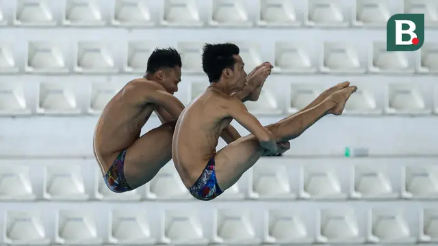 Foto: Penampilan Kompak Pasangan Senior Andriyan dan Adityo di Loncat Indah Kejurnas Akuatik 2026